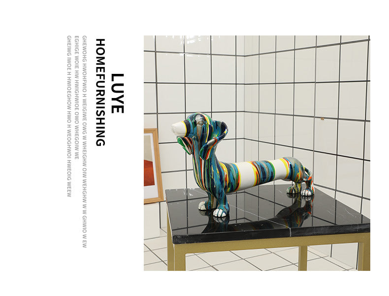 Artigianato in resina colorata, animale, cane bassotto