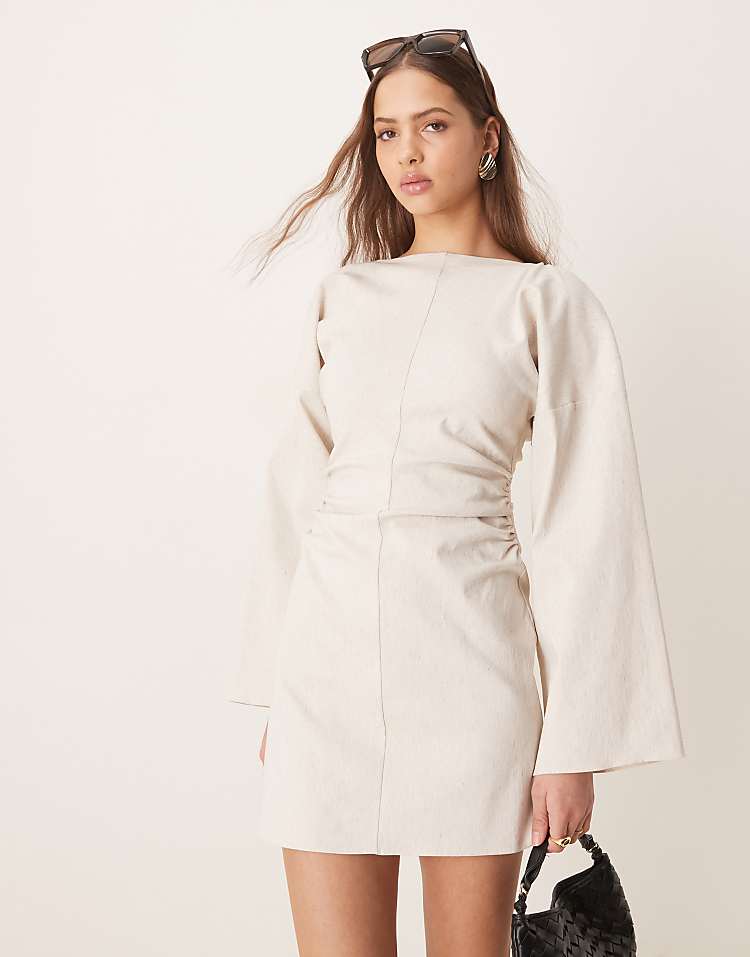 https://images.asos-media.com/products/asos-design-linen-look-bengaline-flared-sleeve-open-back-mini-dress-in-oatmeal/207761007-1-oat?$n_750w$&wid=750&fit=constrain