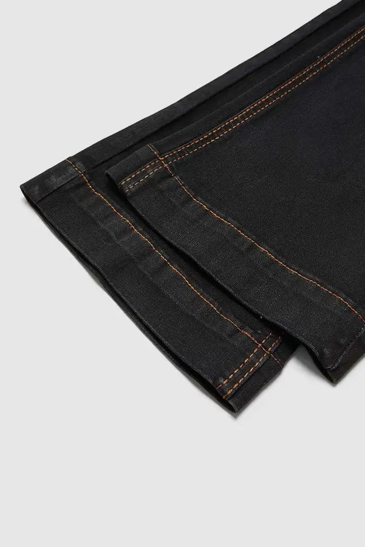 Jeans bootcut a vita alta, contenitivo con doppio bottone in vita, denim scuro