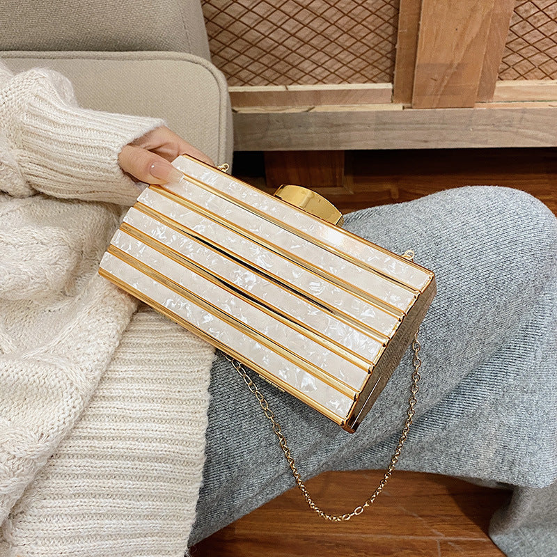 Borsa da sera in acrilico geometrica