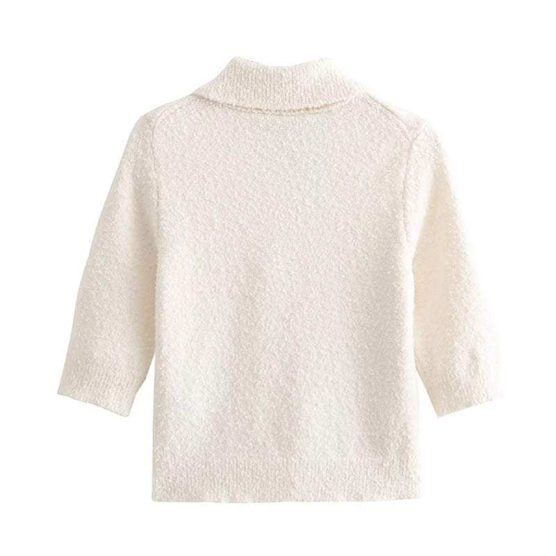 Maglione elegante con risvolto e maniche a gomito