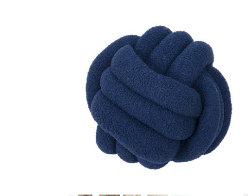 Cuscino a forma di palla annodata