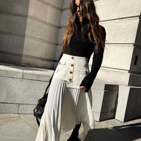 Gonna plissettata con tasche multiple e bottoni, cuciture irregolari in chiffon