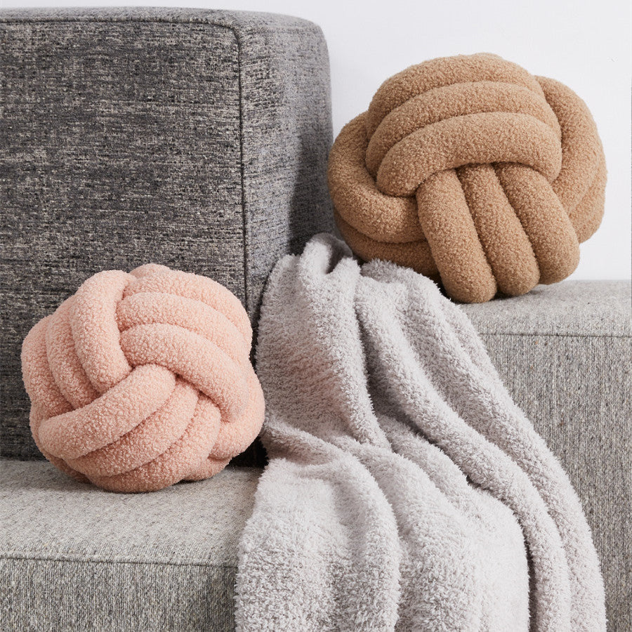 Cuscino a forma di palla annodata