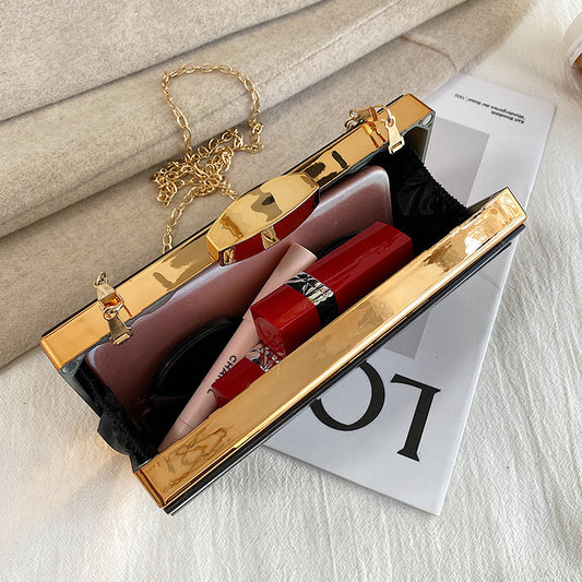 Borsa da sera in acrilico geometrica