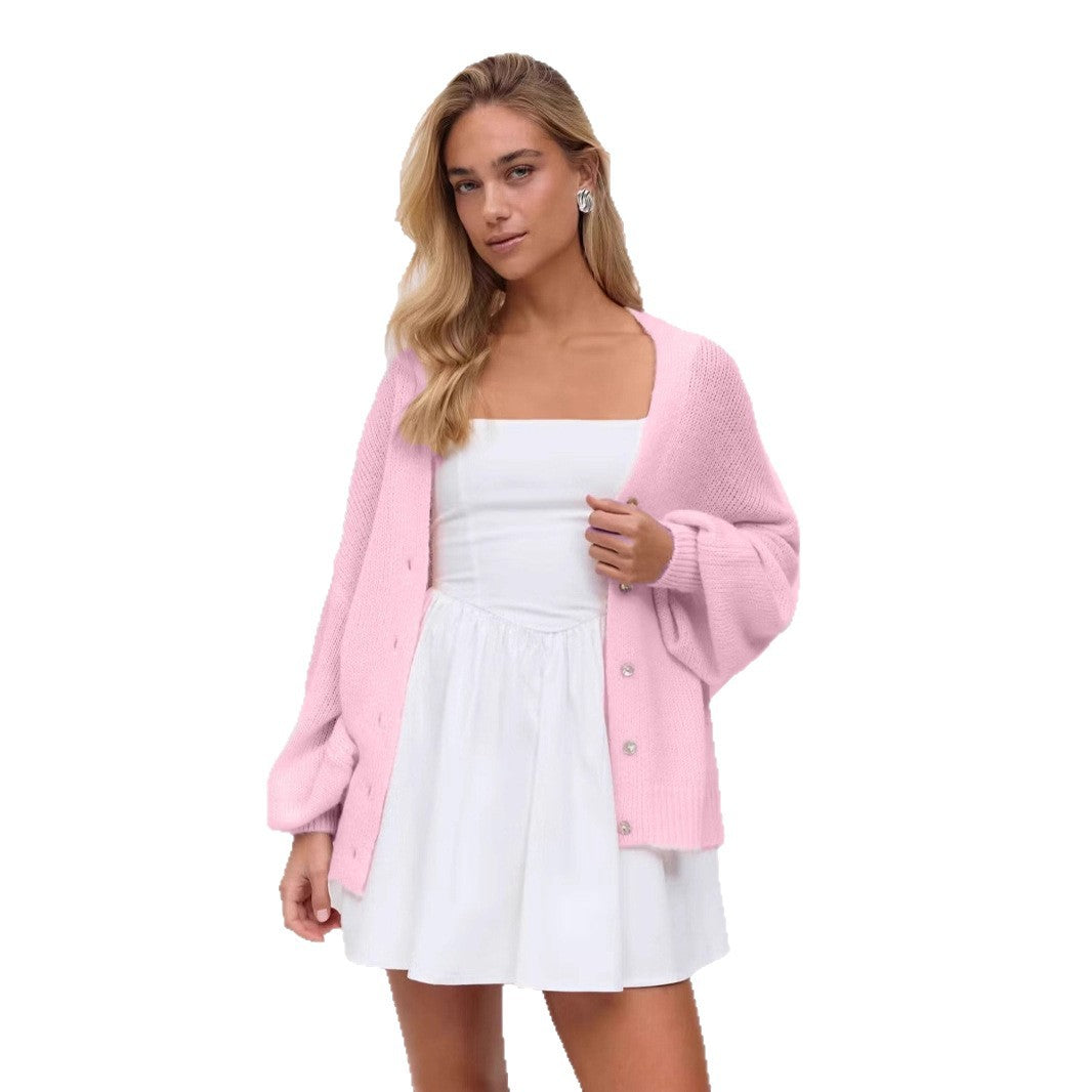 Maglione con maniche a lanterna, elegante e scollo a V in morbido mohair e fibbia a conchiglia