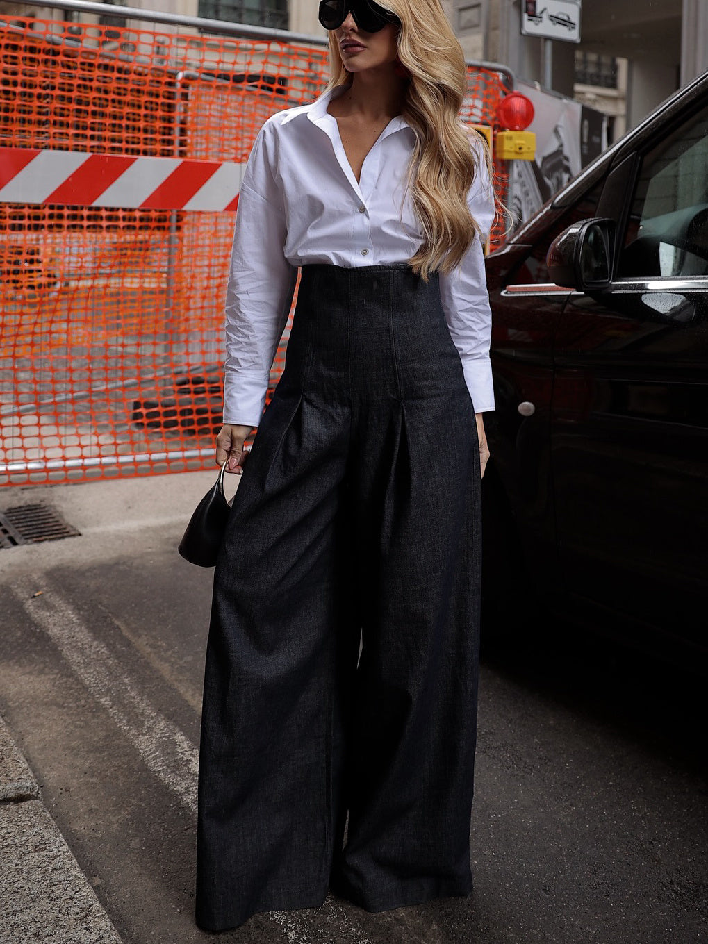 Eleganti jeans a vita alta e gamba larga