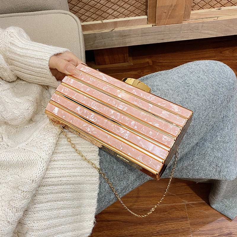 Borsa da sera in acrilico geometrica