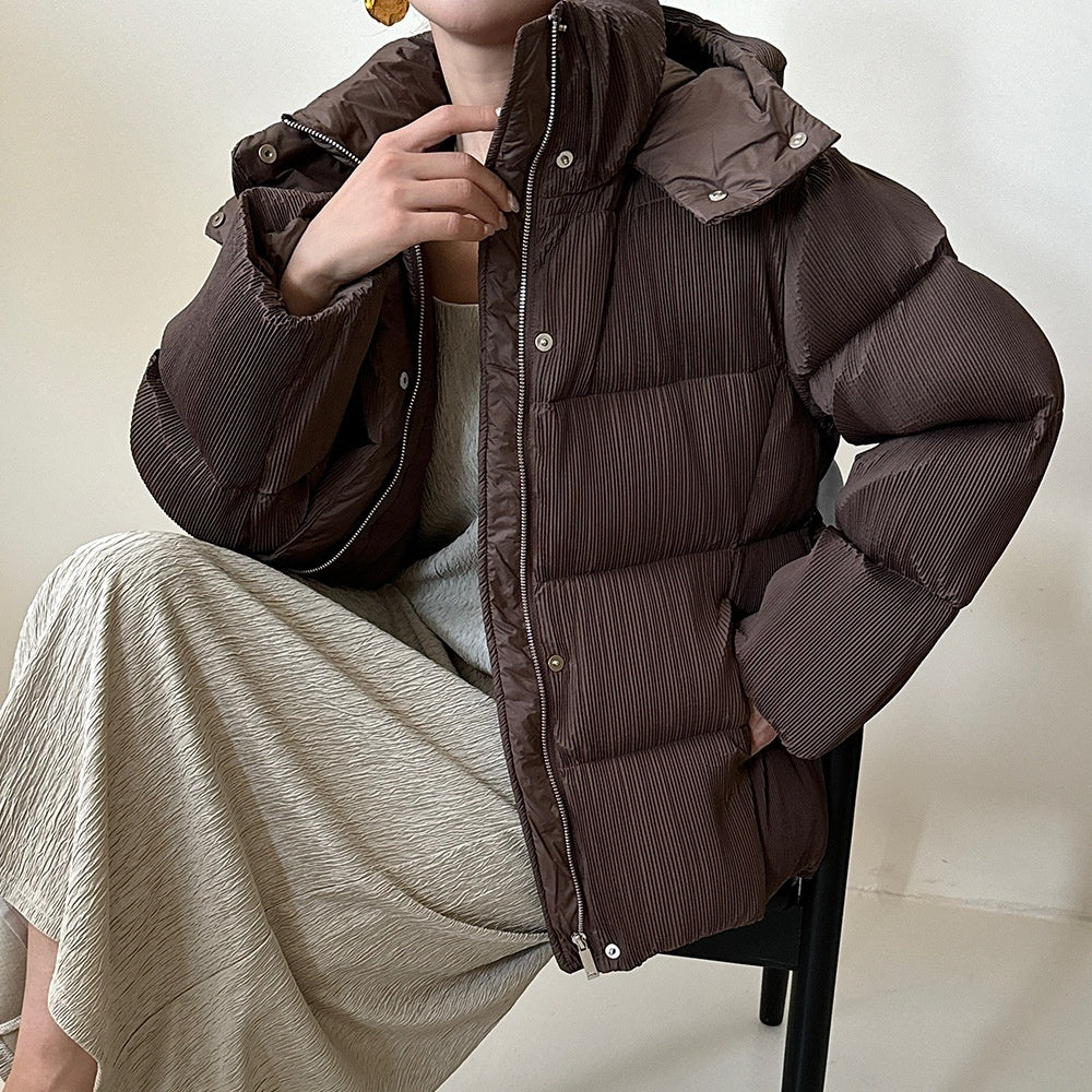 Piumino con cintura in vita