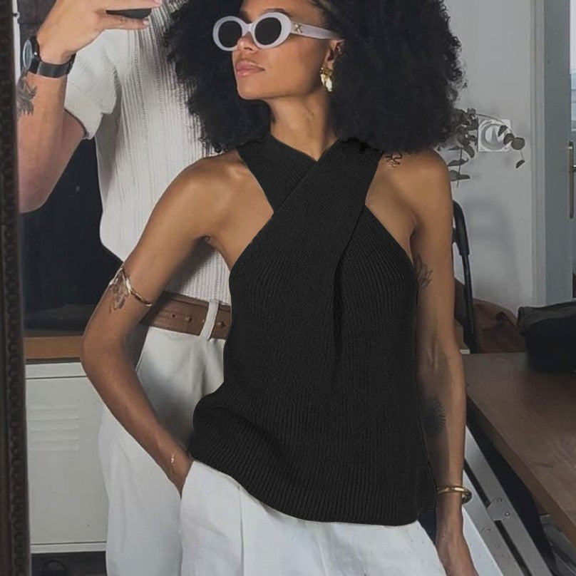 Top elegante in maglia con scollo all'americana incrociato e spalline sottili