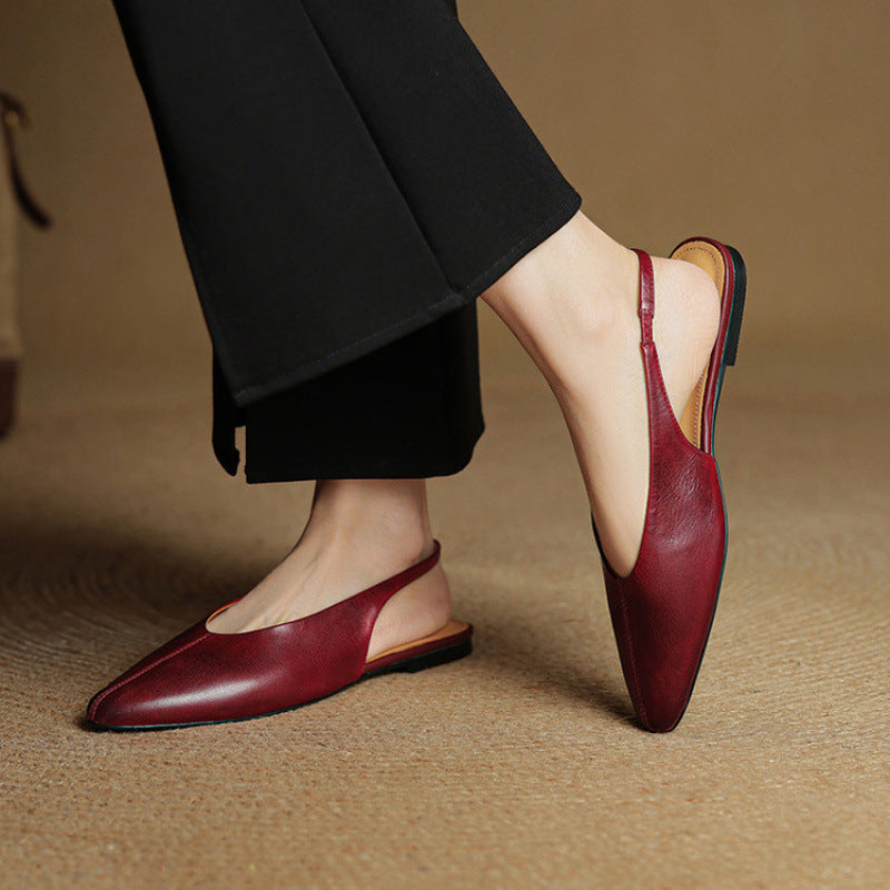 Scarpe da donna a punta in pelle traforata con tomaia bassa